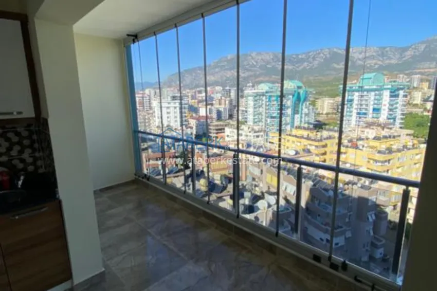 Приобрести Дуплекс в Махмутларе в благоустроенном комплексе рядом с морем 39 