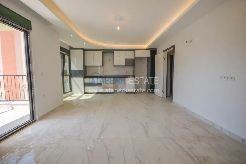 Приобрести Новостройки Алании – квартира в центре Махмутлара, с чистовой отделкой 3 