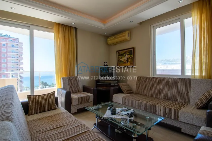 Приобрести Квартира с открытым видом на море в Махмутларе с мебелью в комплексе на первой береговой линии  3 