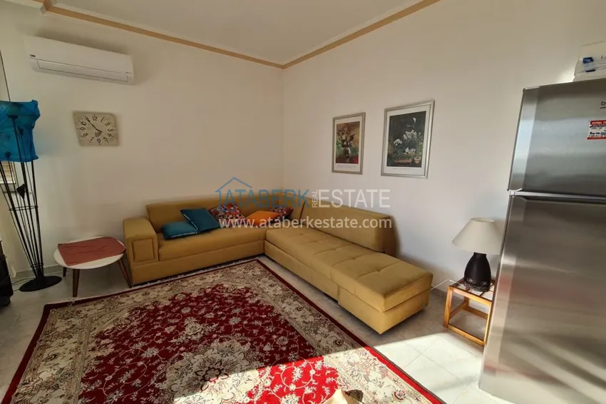 Приобрести Двухкомнатная квартира в районе Авсаллар с видом на море, балкон застеклен 3 