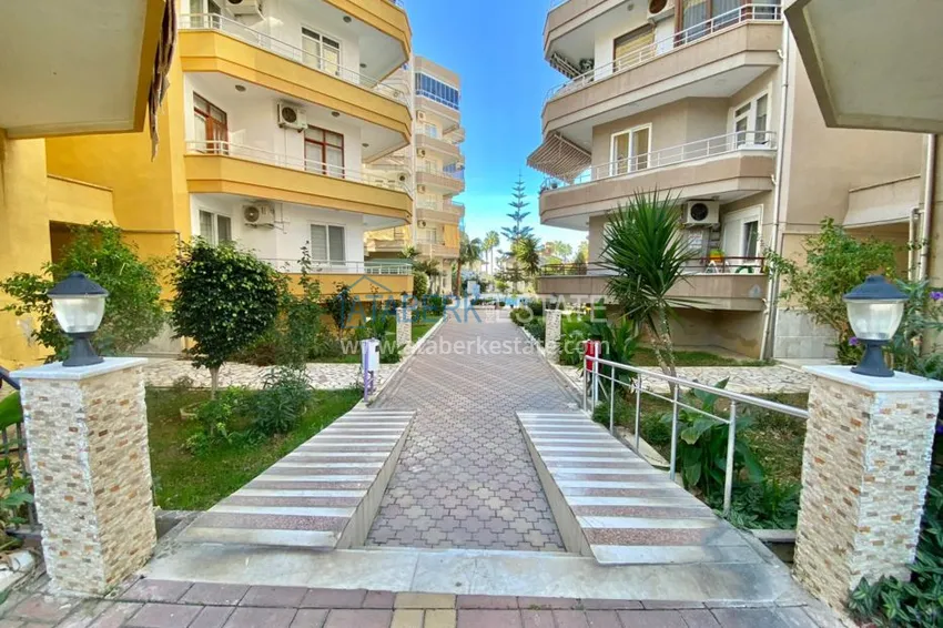 Квартира в Махмутларе трехкомнатная с мебелью, отдельной кухней и видом на море 4 