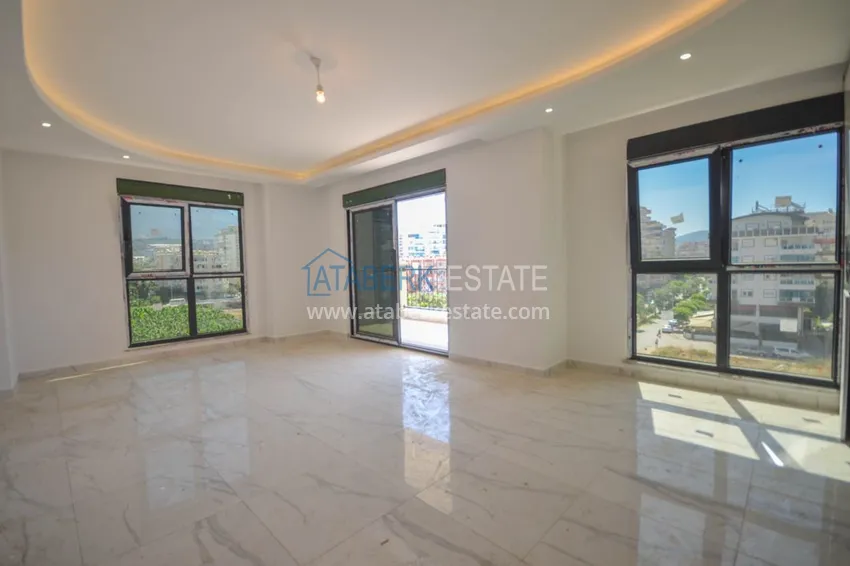 Приобрести Новостройки Алании – квартира в центре Махмутлара, с чистовой отделкой 4 