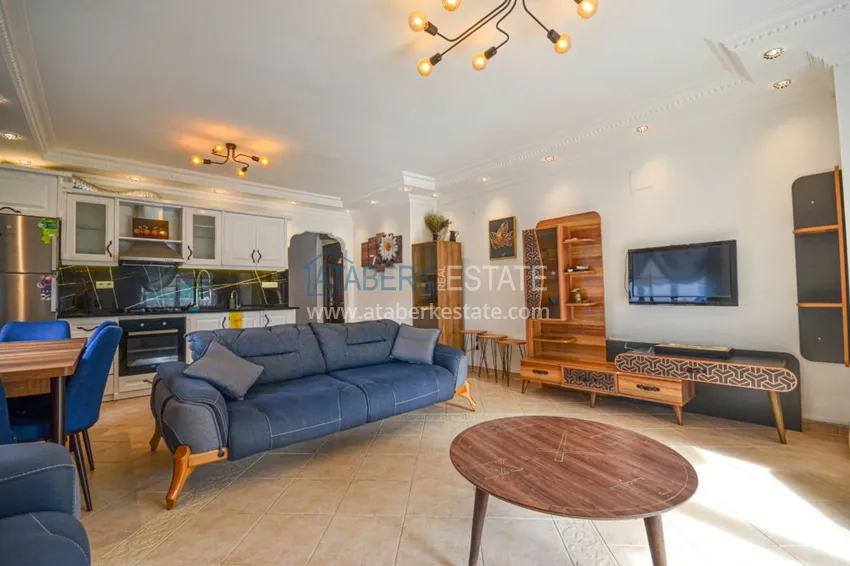 Приобрести Трехкомнатные апартаменты с мебелью в центре курортного городка в Махмутларе 4 