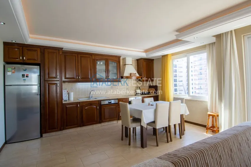 Приобрести Квартира с открытым видом на море в Махмутларе с мебелью в комплексе на первой береговой линии  4 