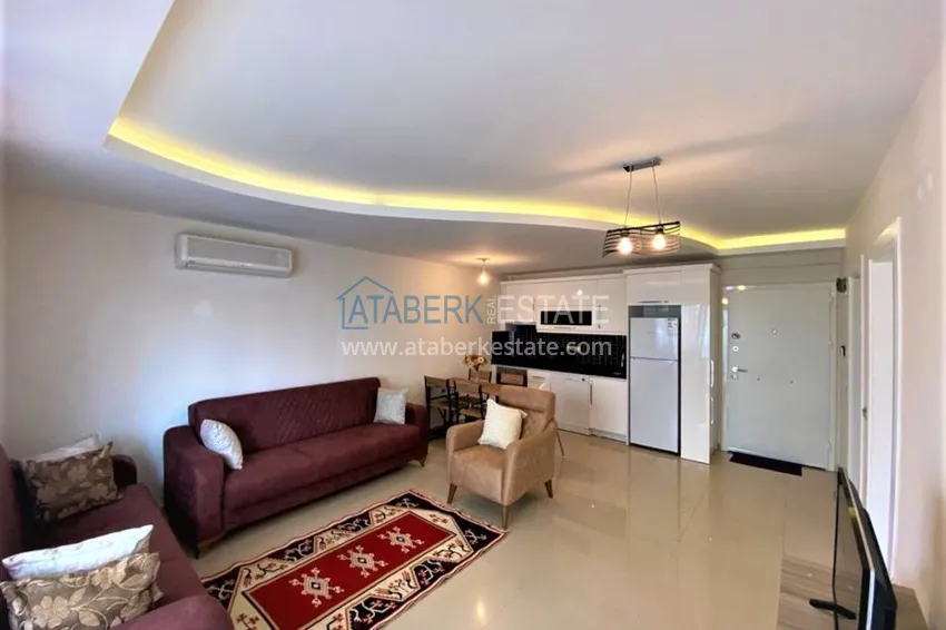 Приобрести Квартира в Махмутларе меблированная, в современном жилом комплексе 4 