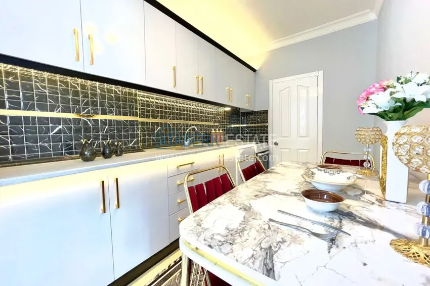 Приобрести Квартира в Махмутларе уютная с отдельной кухней, мебелью 6 