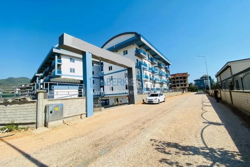 Квартира в районе Оба с чистовой отделкой, в молодом современном комплексе 4 