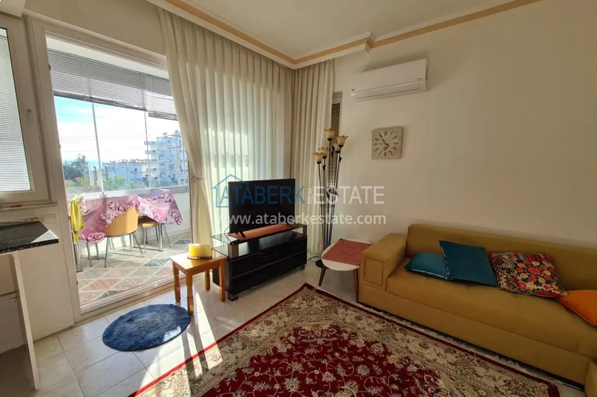 Приобрести Двухкомнатная квартира в районе Авсаллар с видом на море, балкон застеклен 4 