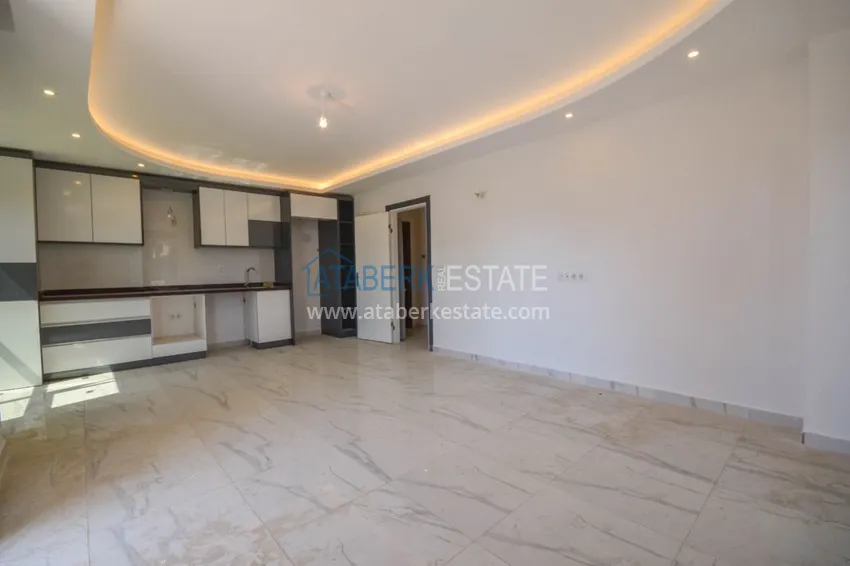 Приобрести Новостройки Алании – квартира в центре Махмутлара, с чистовой отделкой 5 