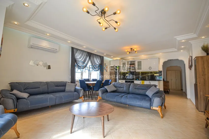 Приобрести Трехкомнатные апартаменты с мебелью в центре курортного городка в Махмутларе 5 