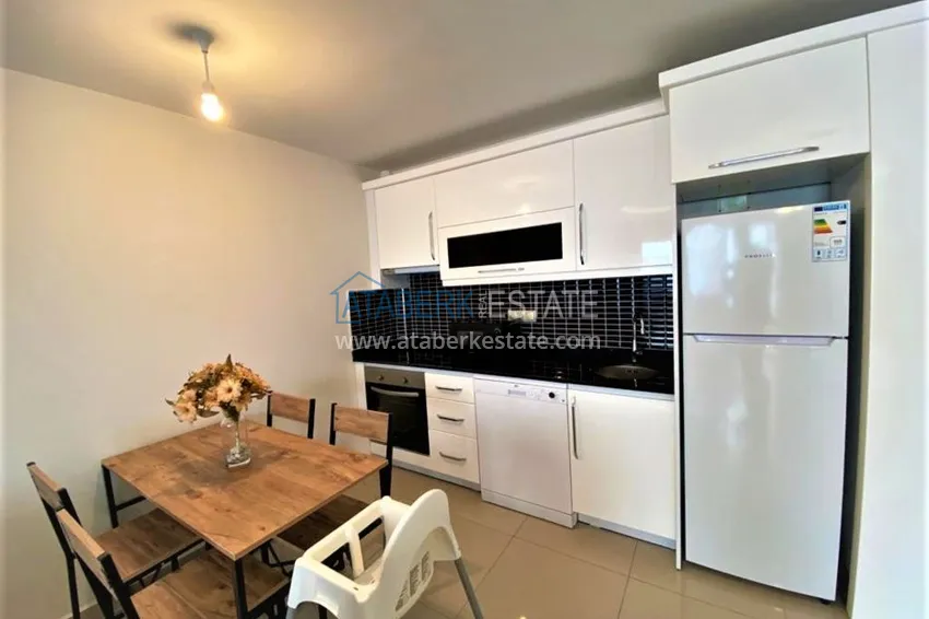 Приобрести Квартира в Махмутларе меблированная, в современном жилом комплексе 5 