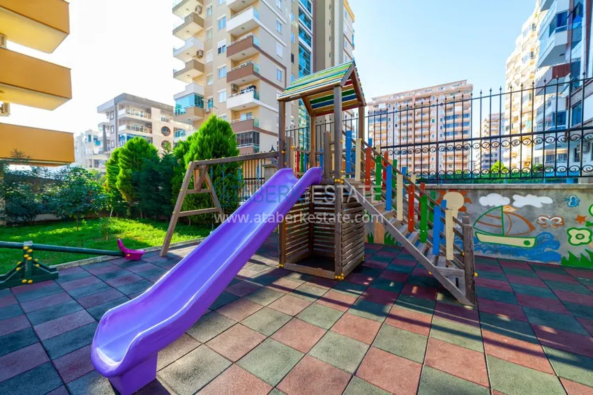 Квартира в Махмутларе двухкомнатная с частичным видом на море 10 