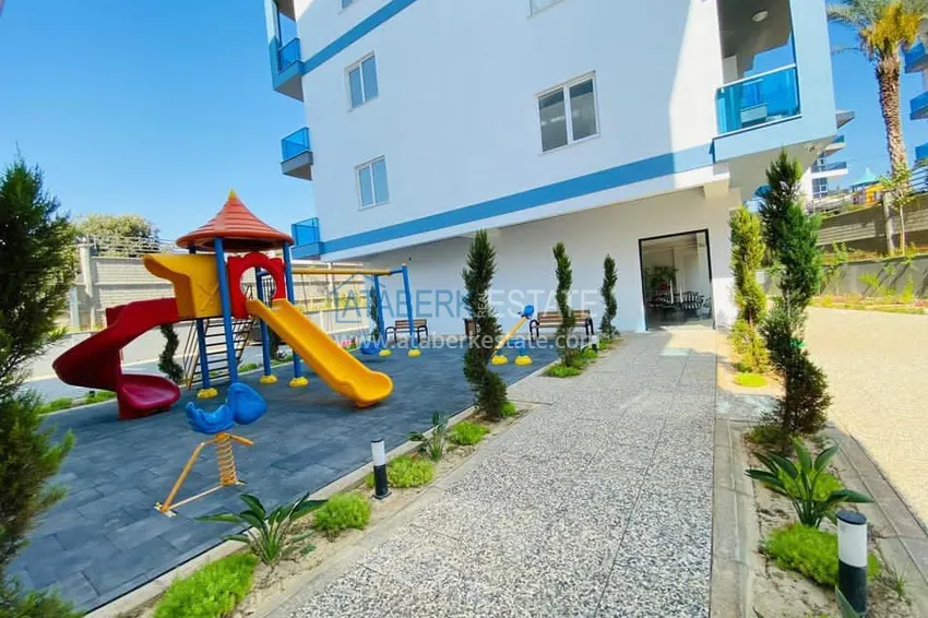 Квартира в районе Оба с чистовой отделкой, в молодом современном комплексе 5 