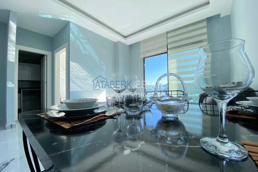 Приобрести Квартира в Махмутларе с новой мебелью в комплексе с бассейном  7 