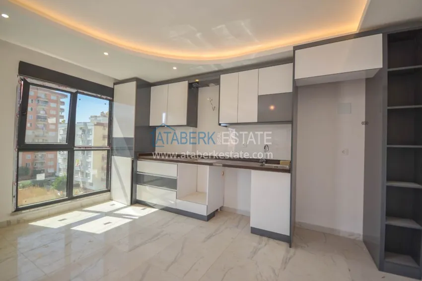 Приобрести Новостройки Алании – квартира в центре Махмутлара, с чистовой отделкой 6 