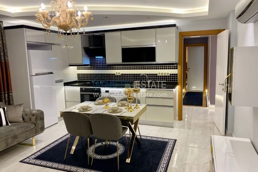 Приобрести Квартира в Махмутларе 2 спальни, отдельная кухня 7 