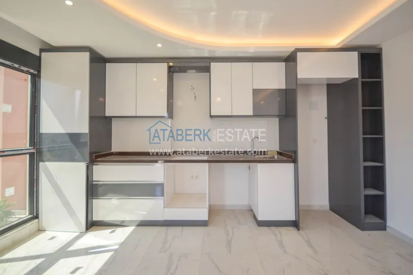 Приобрести Новостройки Алании – квартира в центре Махмутлара, с чистовой отделкой 7 