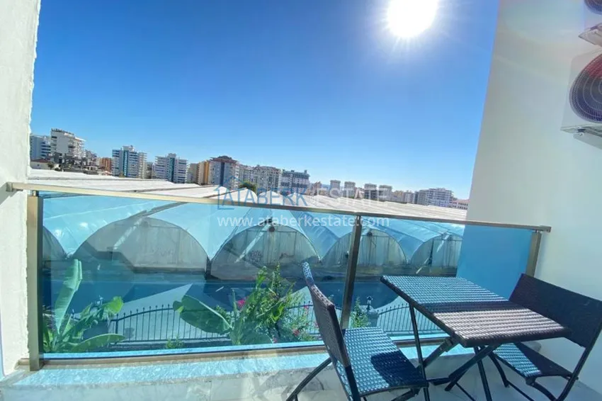 Приобрести Квартира в Махмутларе с новой мебелью в комплексе с бассейном  9 