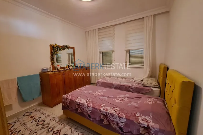 Приобрести Двухкомнатная квартира в районе Авсаллар с видом на море, балкон застеклен 7 