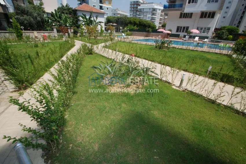 Дуплекс в Махмутларе в благоустроенном комплексе рядом с морем 6 