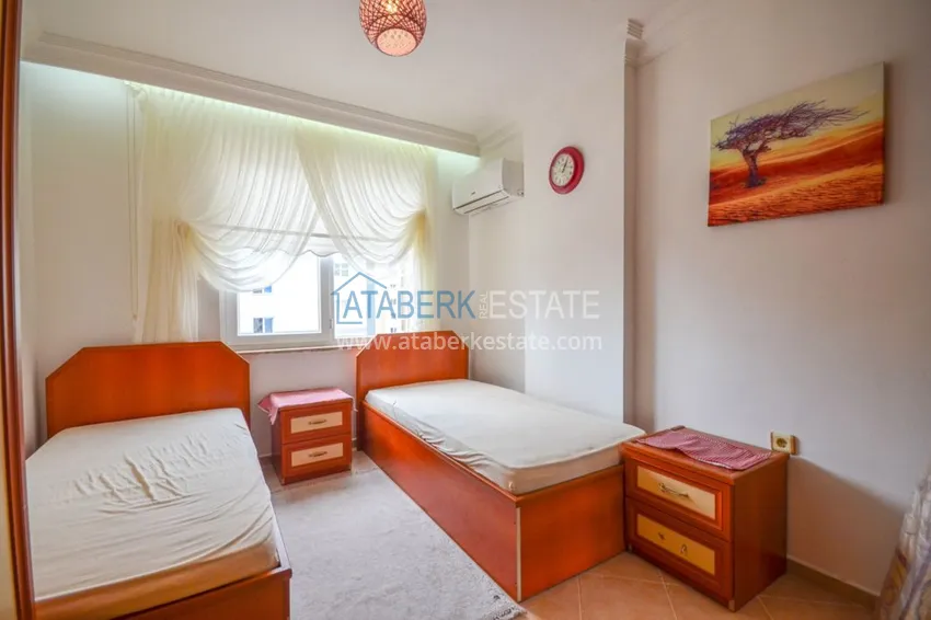 Приобрести Трехкомнатные апартаменты с мебелью в центре курортного городка в Махмутларе 8 