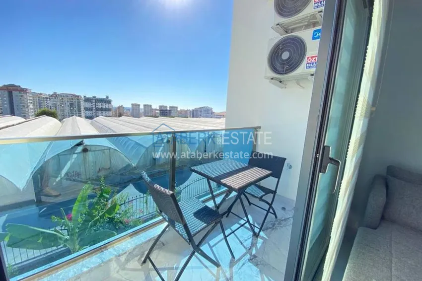 Приобрести Квартира в Махмутларе с новой мебелью в комплексе с бассейном  10 