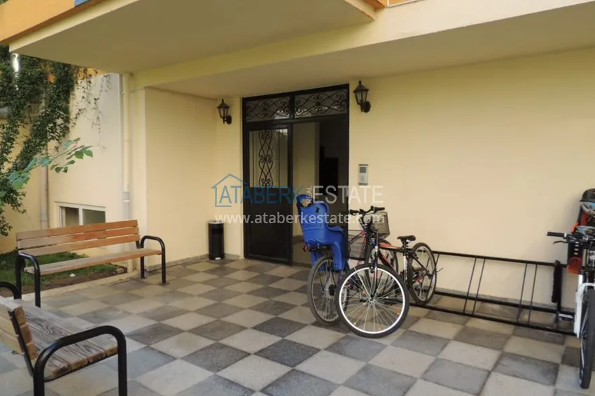 Квартира в Махмутларе двухкомнатная с частичным видом на море 17 