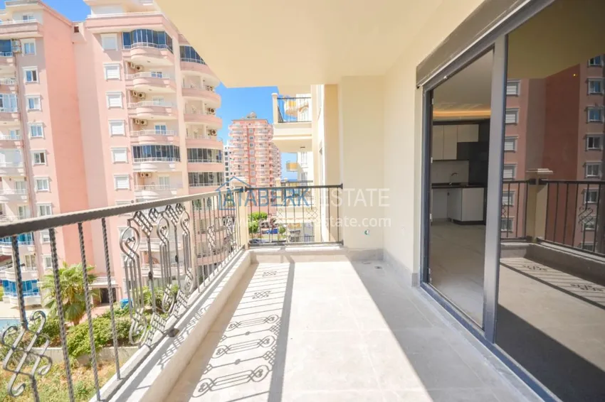 Приобрести Новостройки Алании – квартира в центре Махмутлара, с чистовой отделкой 9 