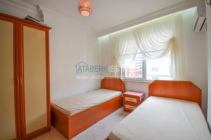 Приобрести Трехкомнатные апартаменты с мебелью в центре курортного городка в Махмутларе 9 