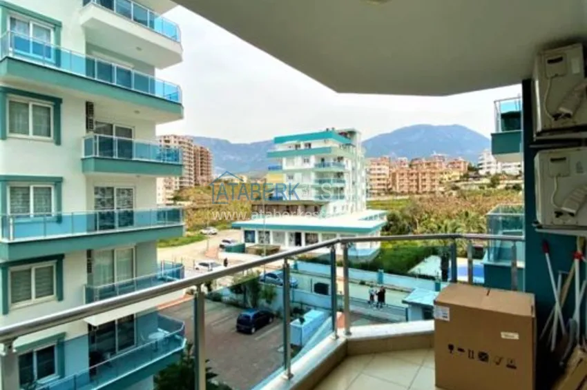 Приобрести Квартира в Махмутларе меблированная, в современном жилом комплексе 9 