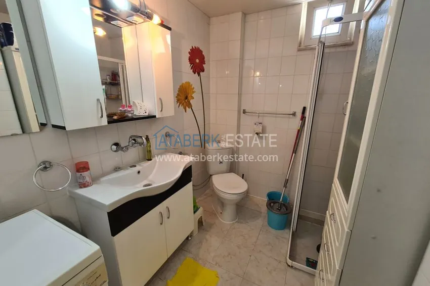 Приобрести Двухкомнатная квартира в районе Авсаллар с видом на море, балкон застеклен 9 