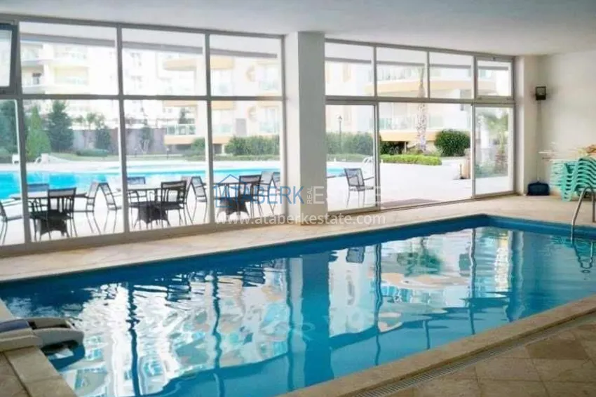 Квартира в Махмутларе двухкомнатная с частичным видом на море 18 