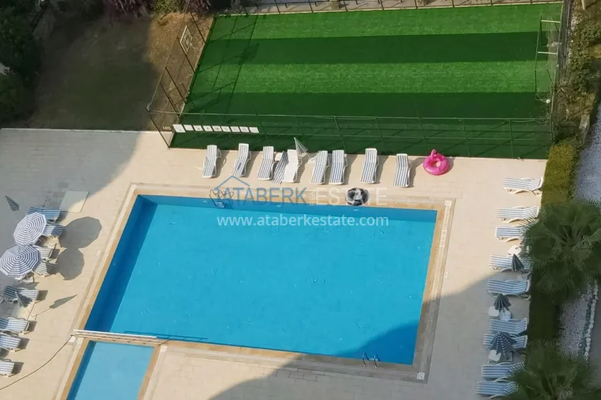 Приобрести Квартира в Махмутларе с мебелью, в уютном жилом комплексе 10 