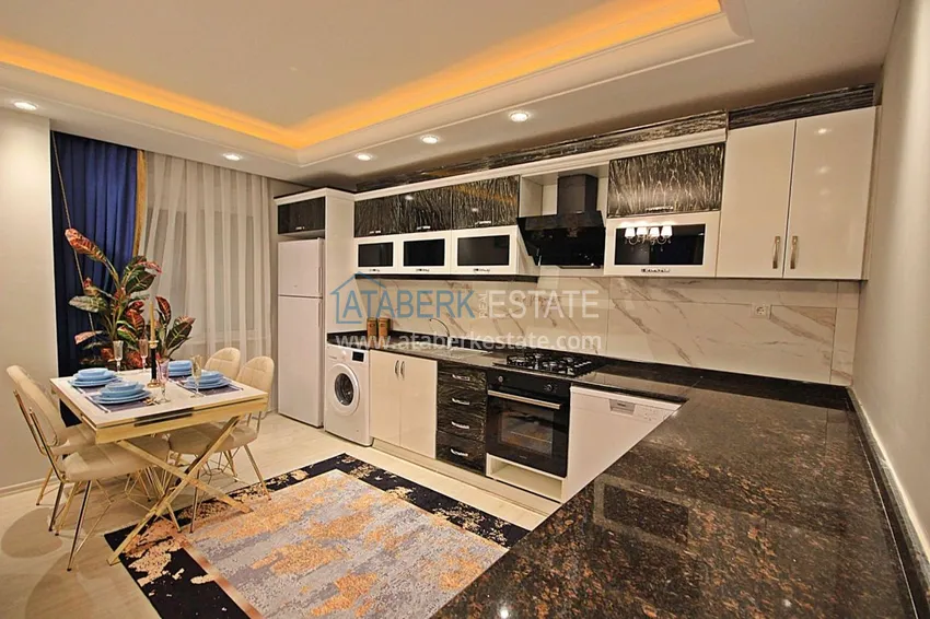 Приобрести Квартира в Махмутларе с мебелью в комплексе с удобствами 11 