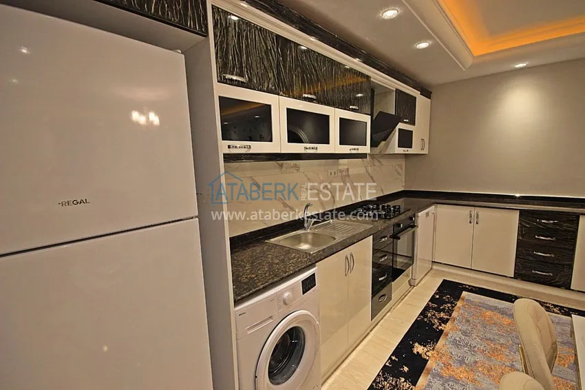 Приобрести Квартира в Махмутларе с мебелью в комплексе с удобствами 12 