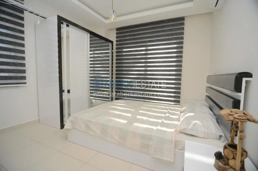 Приобрести Квартира в Махмутларе с террасой у самого моря  15 