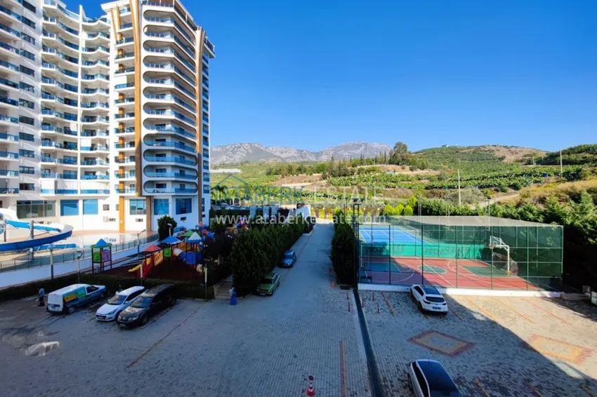 Приобрести Квартира в Махмутларе четырехкомнатная с мебелью в престижном комплексе 17 