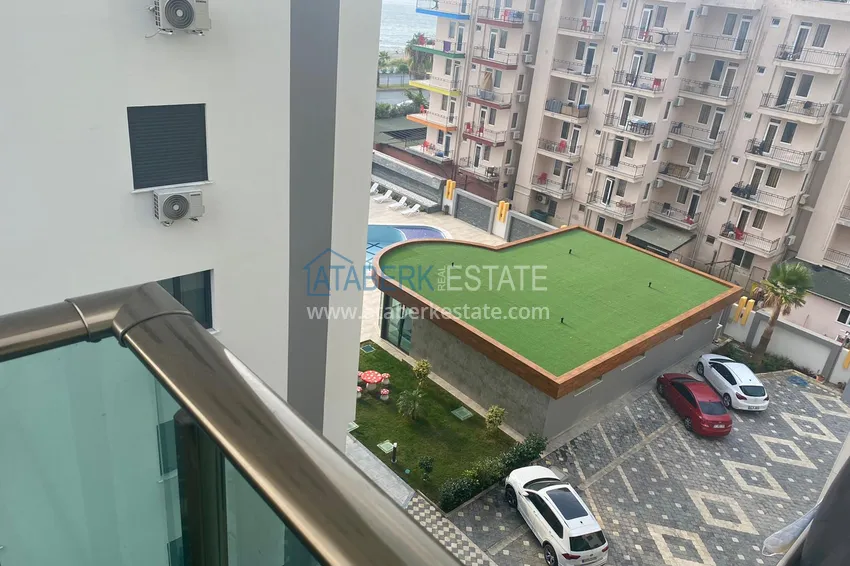 Приобрести Квартира в Махмутларе с чистовой отделкой в новом комплексе, на первой береговой 16 