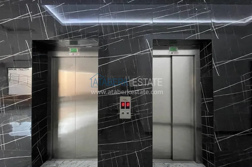 Квартира в районе Махмутлар двухкомнатная с чистовой отделкой  15 