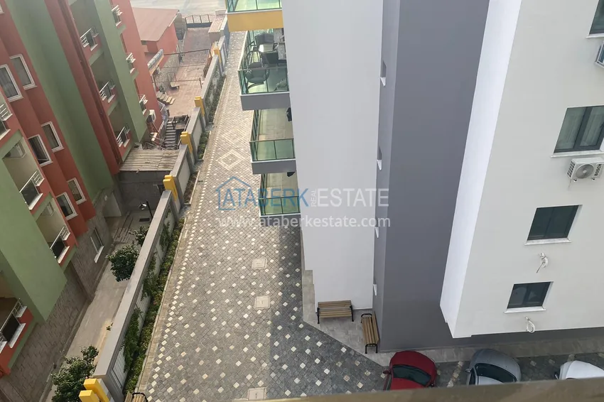 Приобрести Квартира в Махмутларе с чистовой отделкой в новом комплексе, на первой береговой 17 