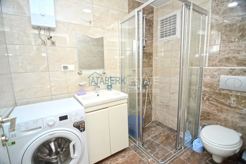 Приобрести Квартира в Махмутларе с террасой у самого моря  19 