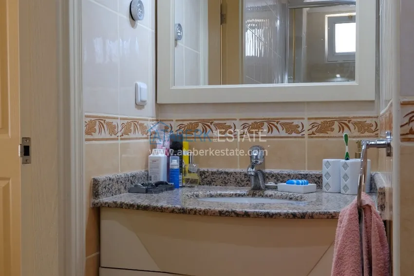 Приобрести Квартира в Махмутларе меблированная в жилом комплексе 19 