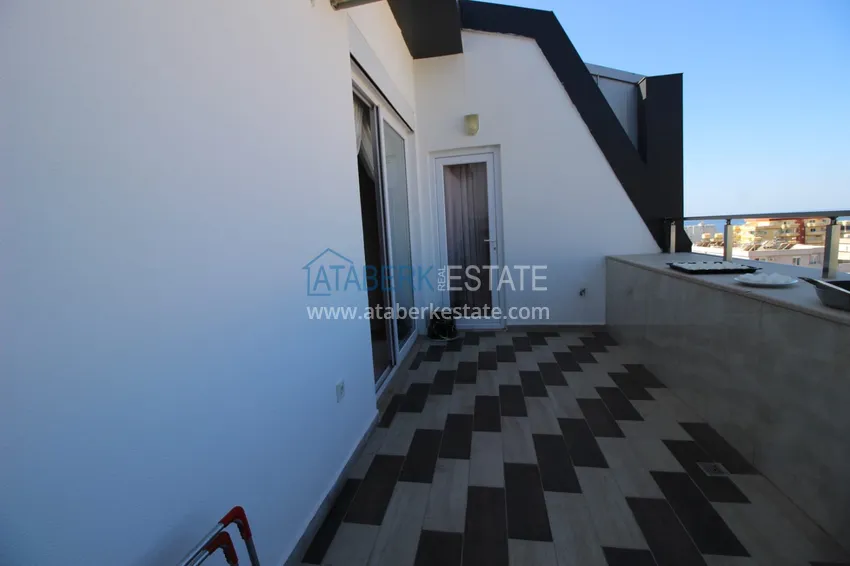 Приобрести Пентхаус-дуплекс в Махмутларе с мебелью и видом на море в комфортабельном комплексе 22 