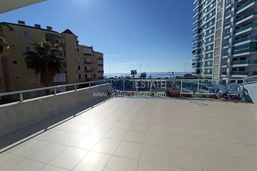 Приобрести Квартира в Махмутларе с террасой у самого моря  20 