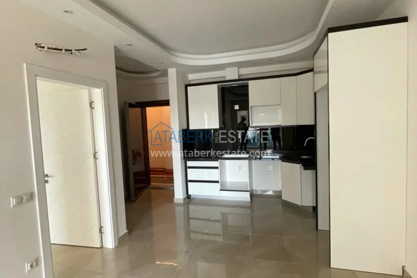 Приобрести Квартира в Махмутларе в молодом комплексе с видом на горы 1 