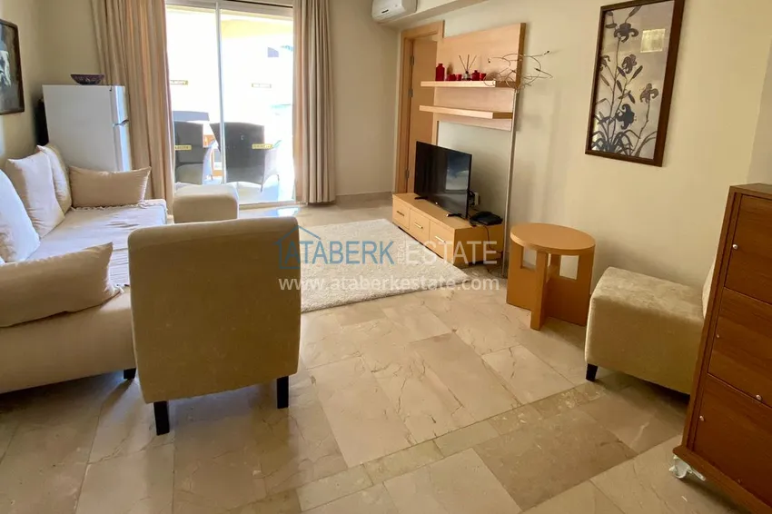 Приобрести Квартира в Махмутларе с мебелью, в элитном жилом комплексе отельного типа 1 