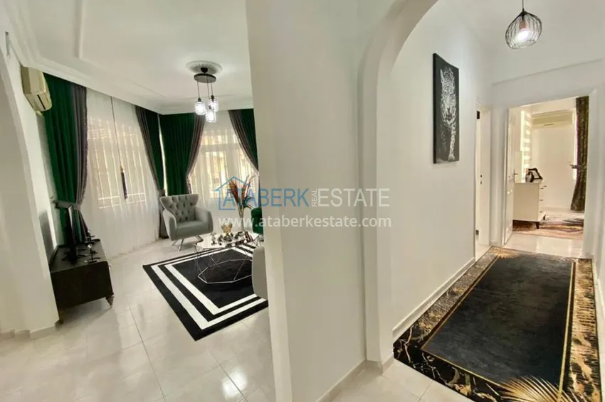 Приобрести Квартира в Махмутларе, трехкомнатная с мебелью, отдельной кухней и видом на море 1 