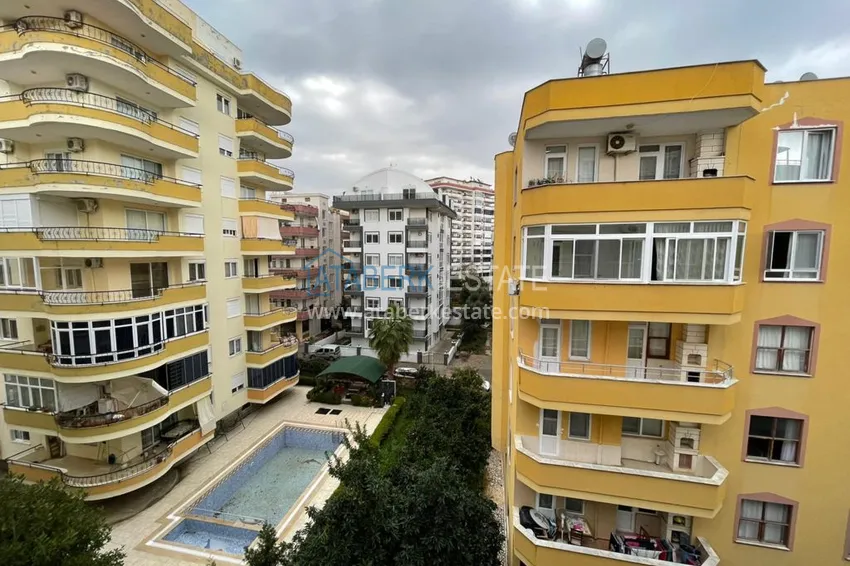 Приобрести Квартира в Махмутларе трехкомнатная с мебелью в комплексе городского типа  8 