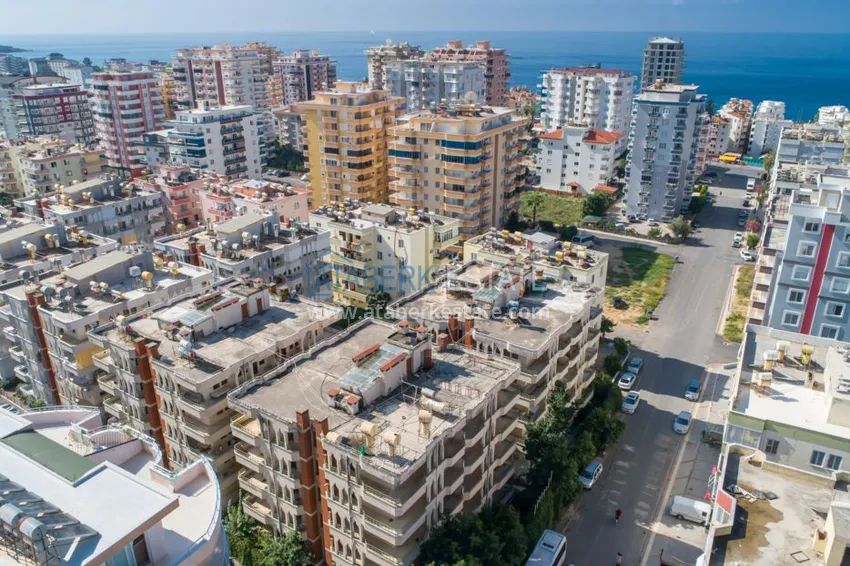 Квартира в Махмутларе с чистовой отделкой, отдельной кухней 3 