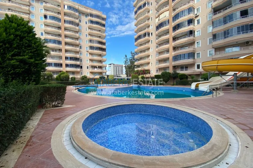 Квартира с мебелью в благоустроенном жилом комплексе в Махмутларе 4 